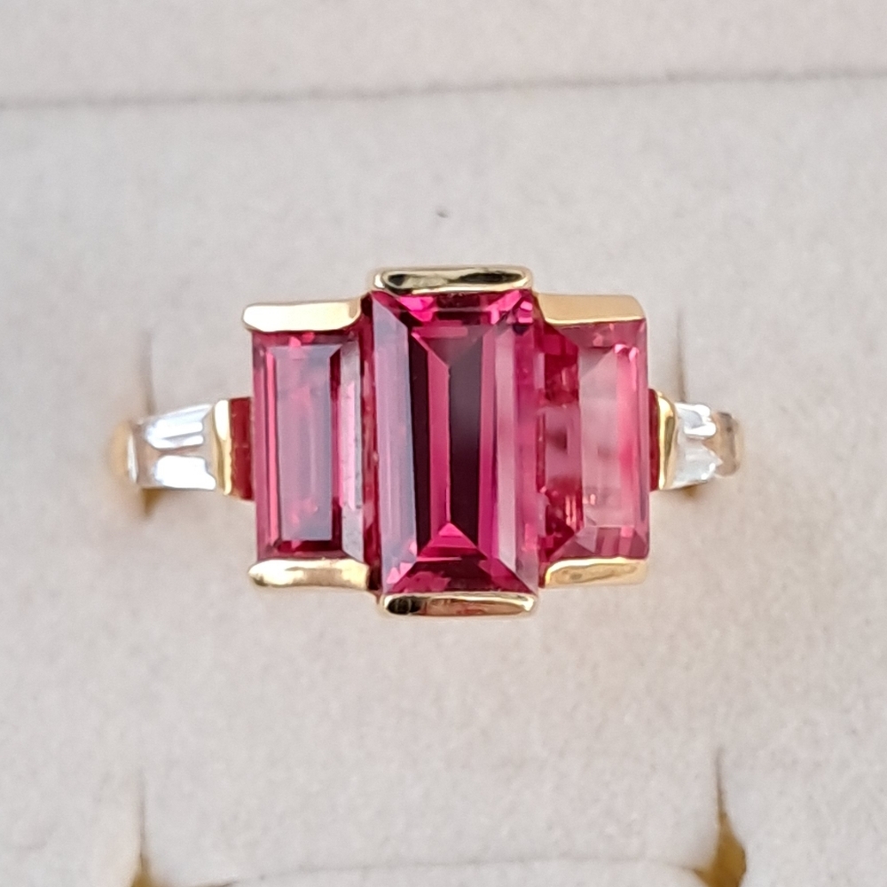 Elegant Pink Gemstone Ring with Gold Accents